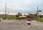 Comenzaron a pavimentar calles Deán Funes y J. J. Paso en los cruces del FFCC Mitre